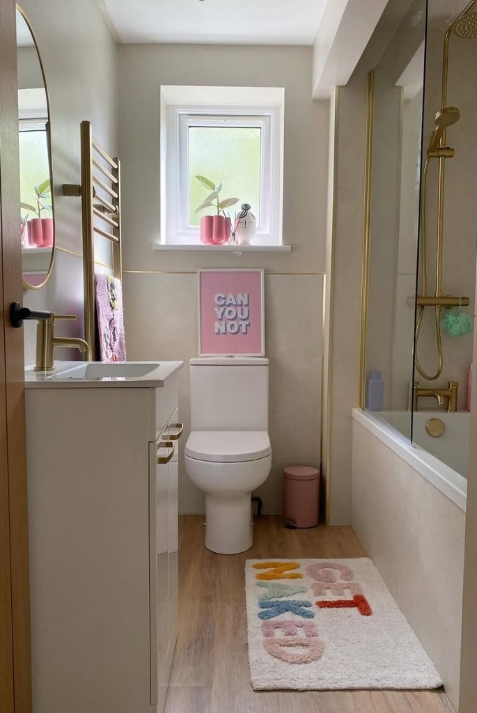 Playful Small Bathroom with Gold Details