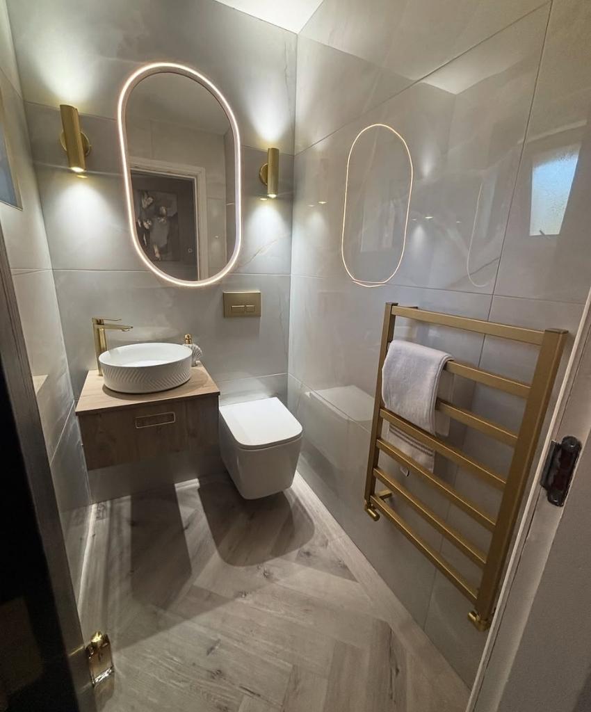 Stylish Small Bathroom with Warm Lighting