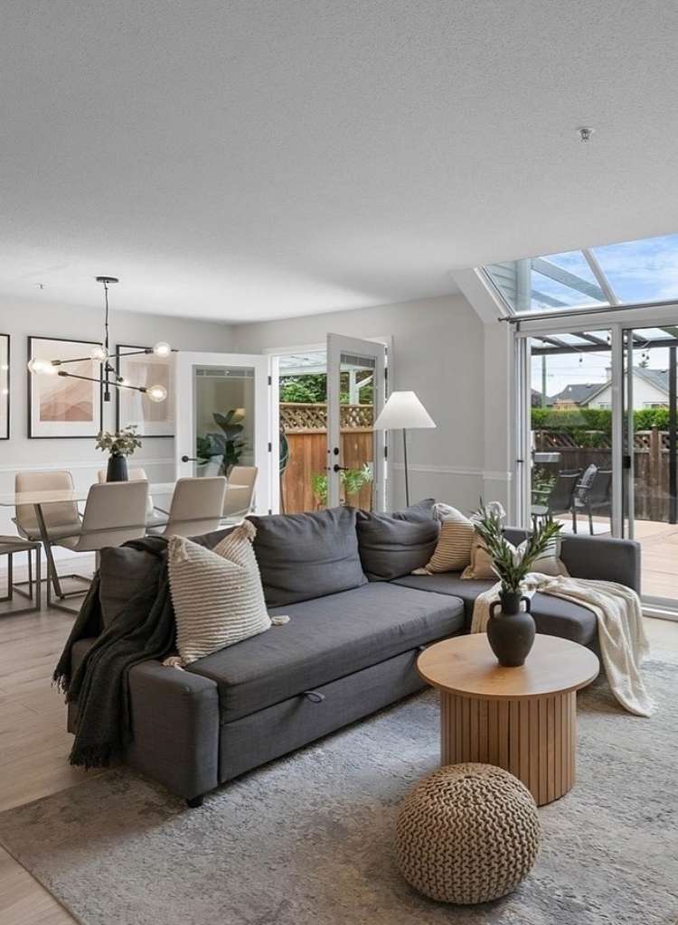 Cozy Dark Gray Sectional in Sunlit Living Space