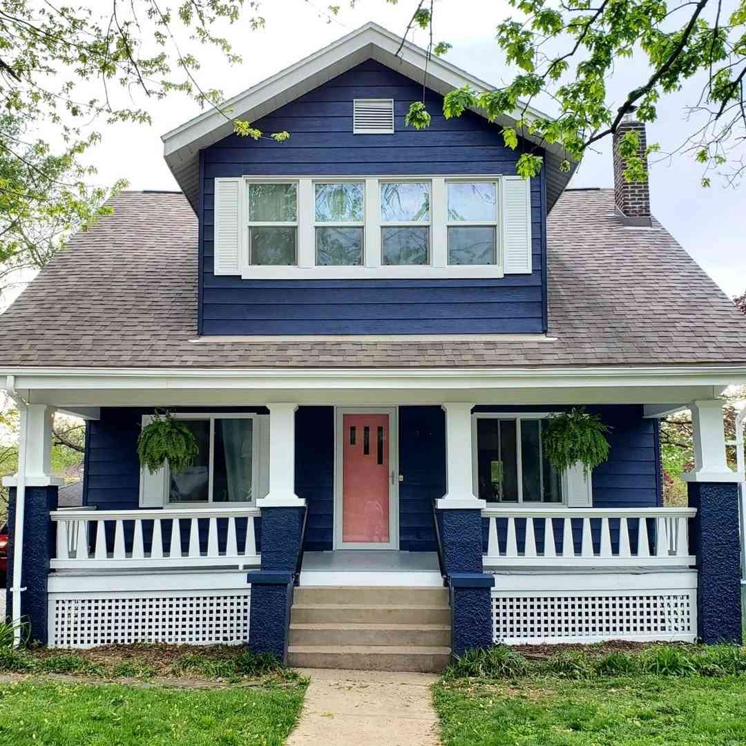 Navy Blue Bungalow with Pink Door