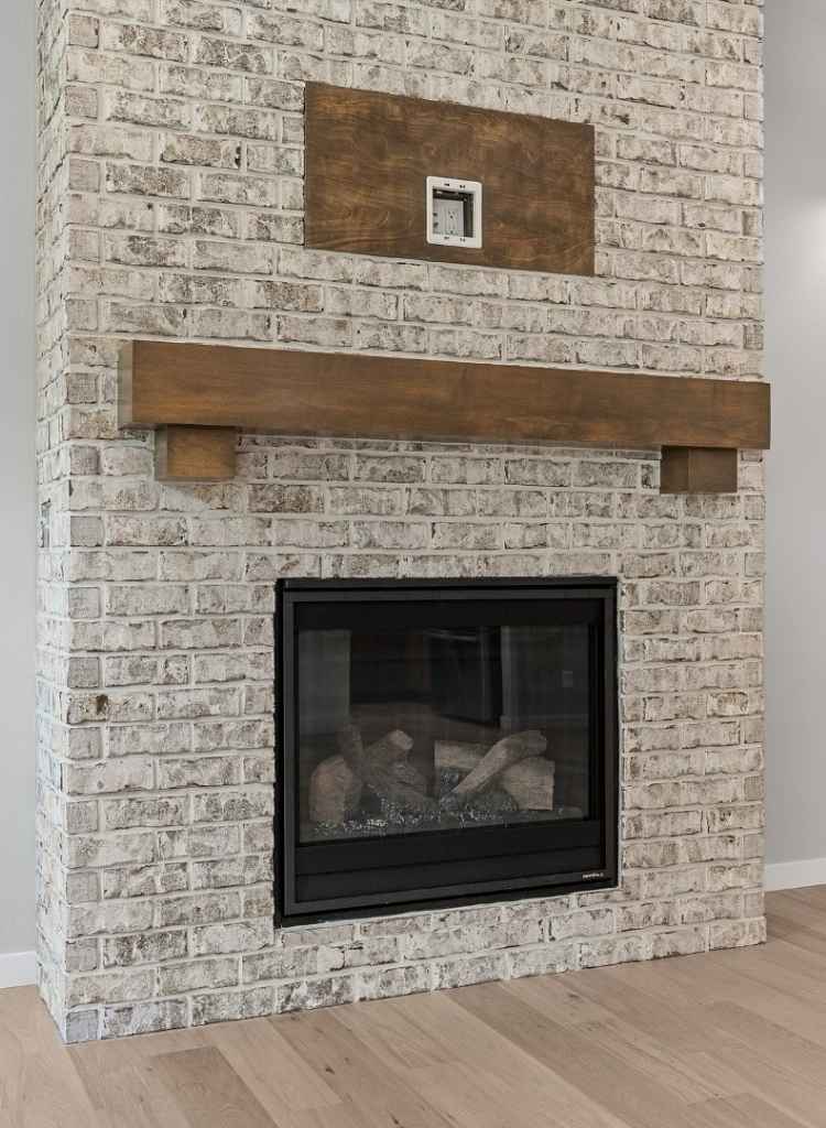Rustic Brick Fireplace with Wooden Mantel