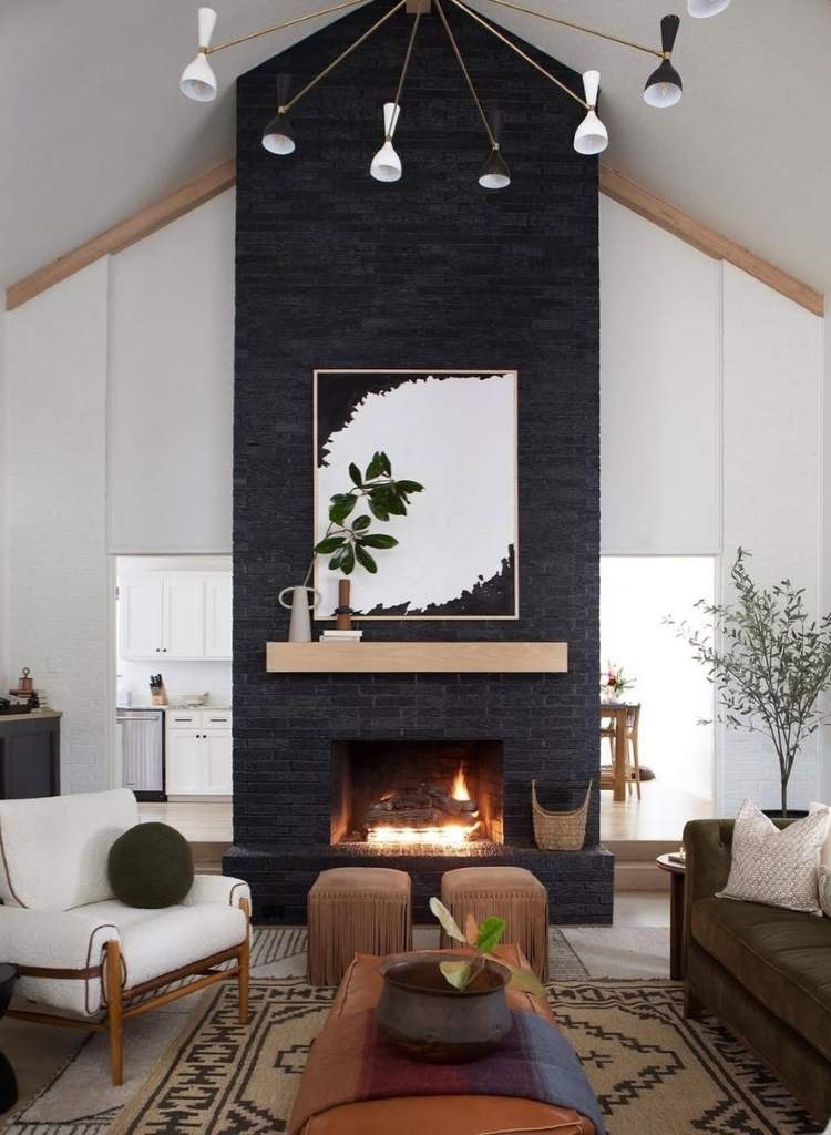 Tall Black Brick Fireplace with Light Mantel