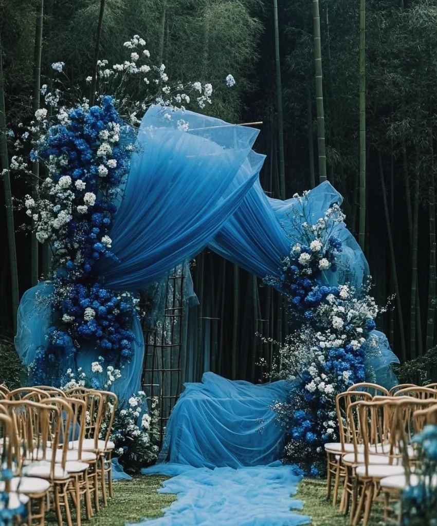 Bold Blue Tulle Forest Ceremony Arch