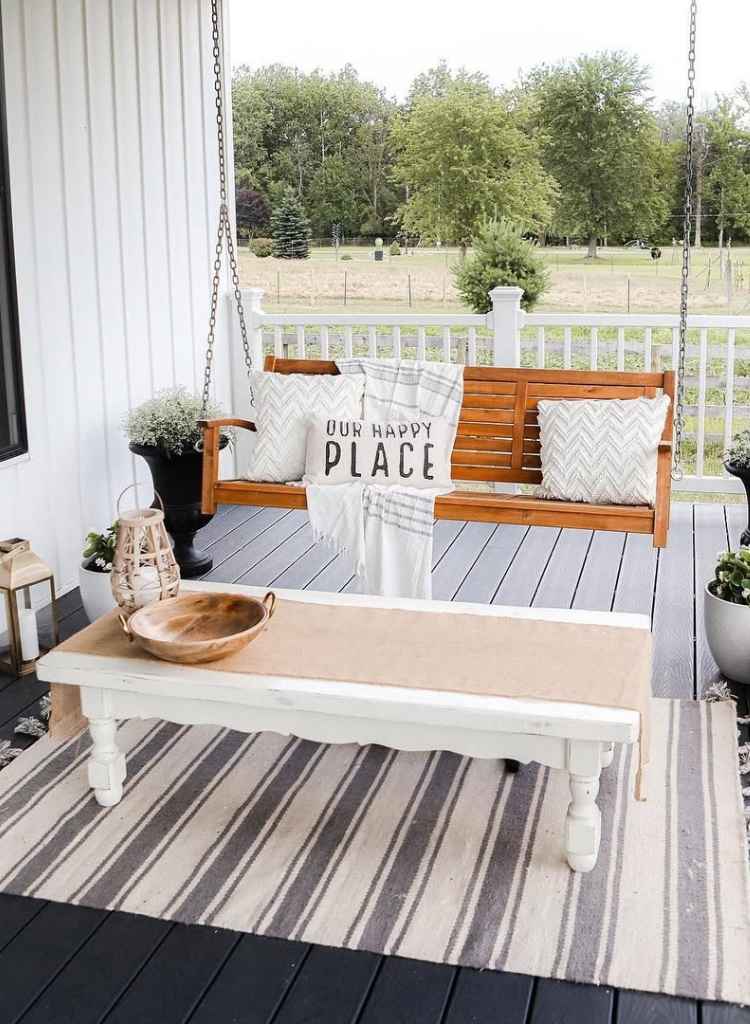 Rustic Wooden Porch Swing With Farmhouse Touch
