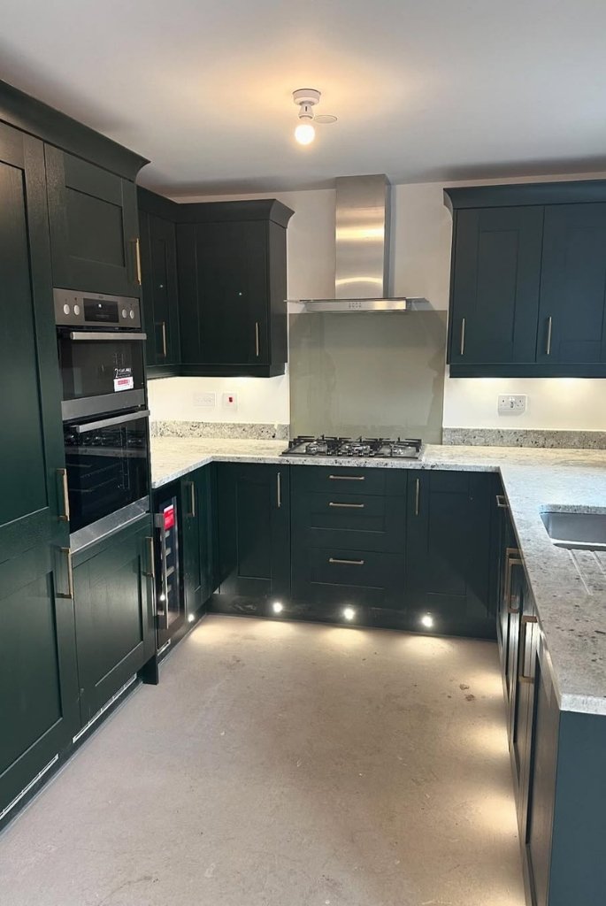 Sleek Underlit Green Kitchen