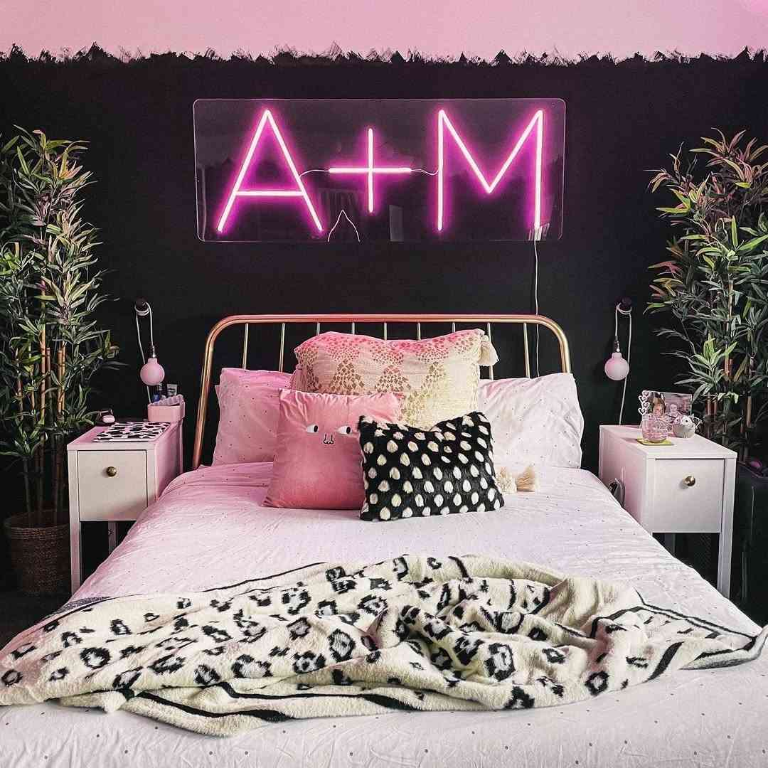 Playful Black Bedroom with Neon Glow