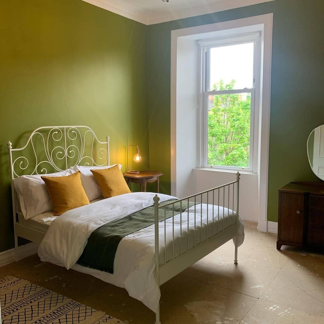 Vintage Bedroom with Iron Frame Bed