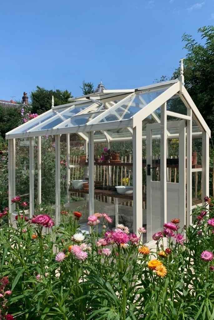 White Frame Cottage Greenhouse