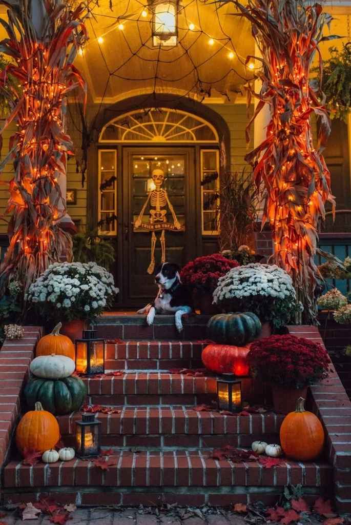 Moody Porch Glow with Mums & Pumpkins