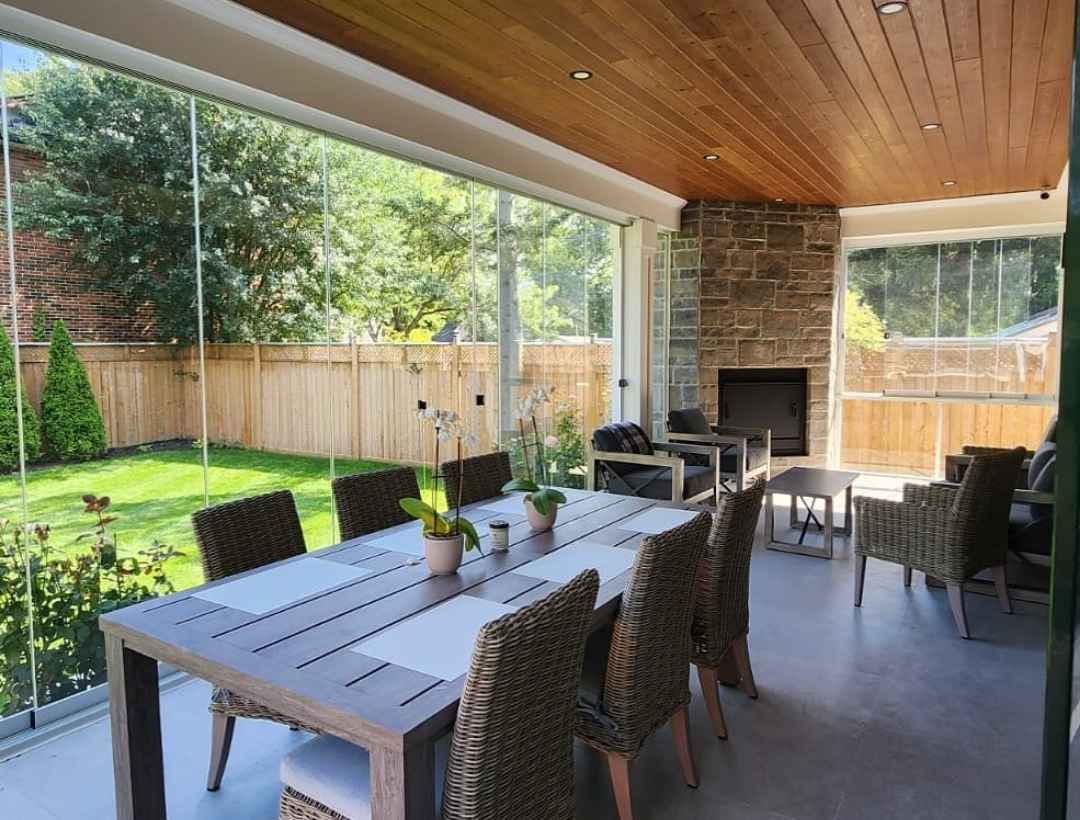 Enclosed Patio Dining with Full Glass Views