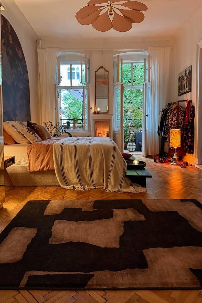 Earthy Bedroom with Parisian Balcony Charm