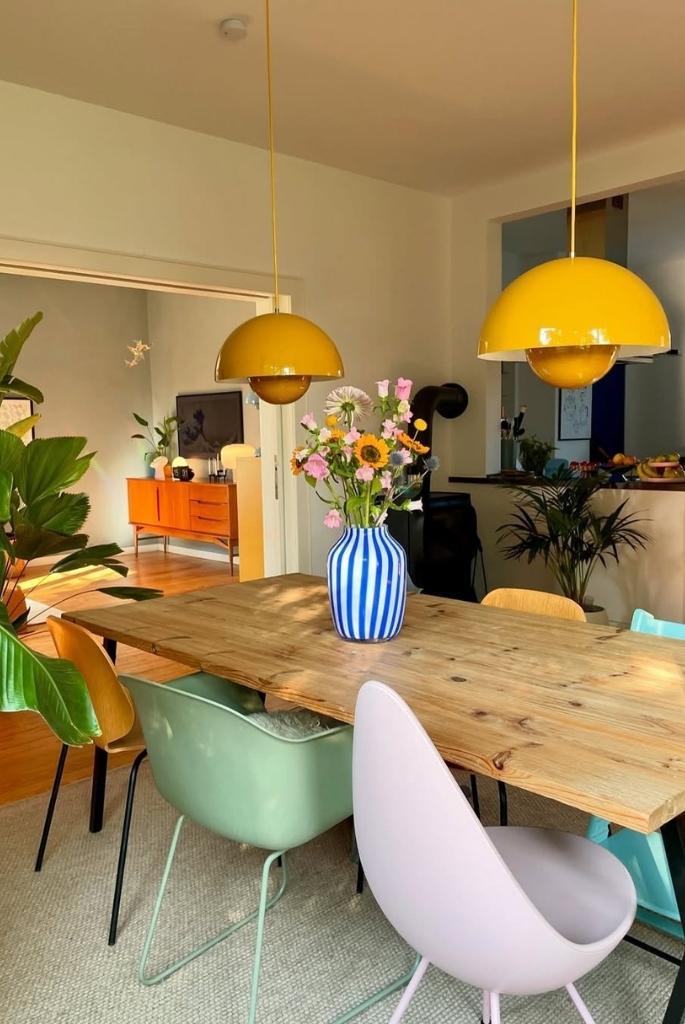 Eclectic Dining Area with Retro Lighting