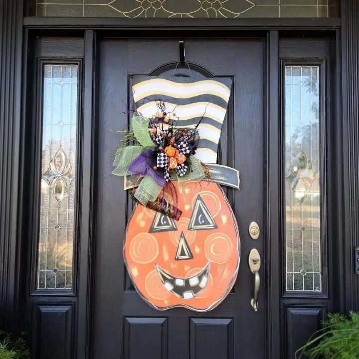 Grinning Pumpkin Hat Door Hanger