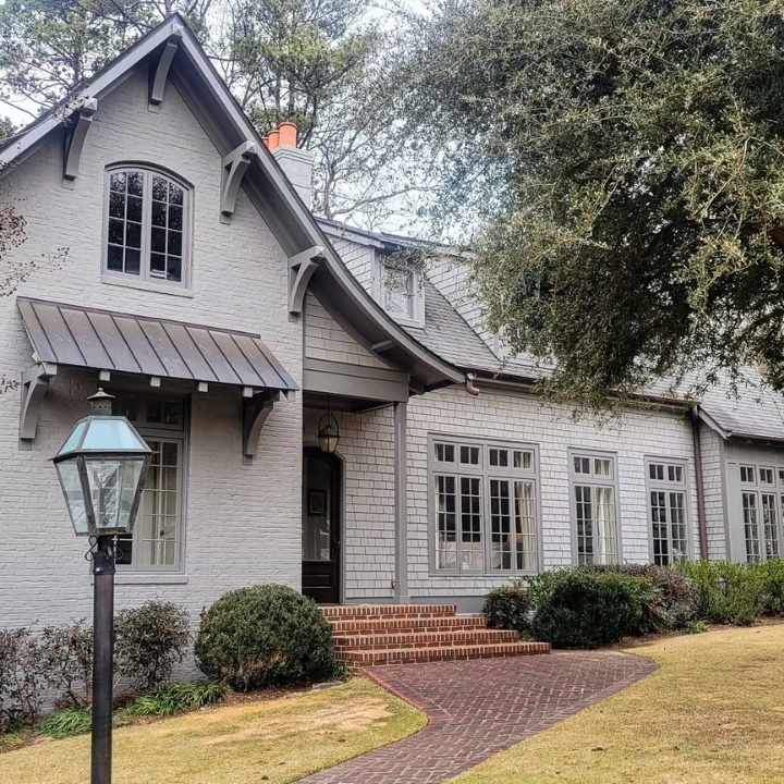 Warm Gray and Brick Red Exterior