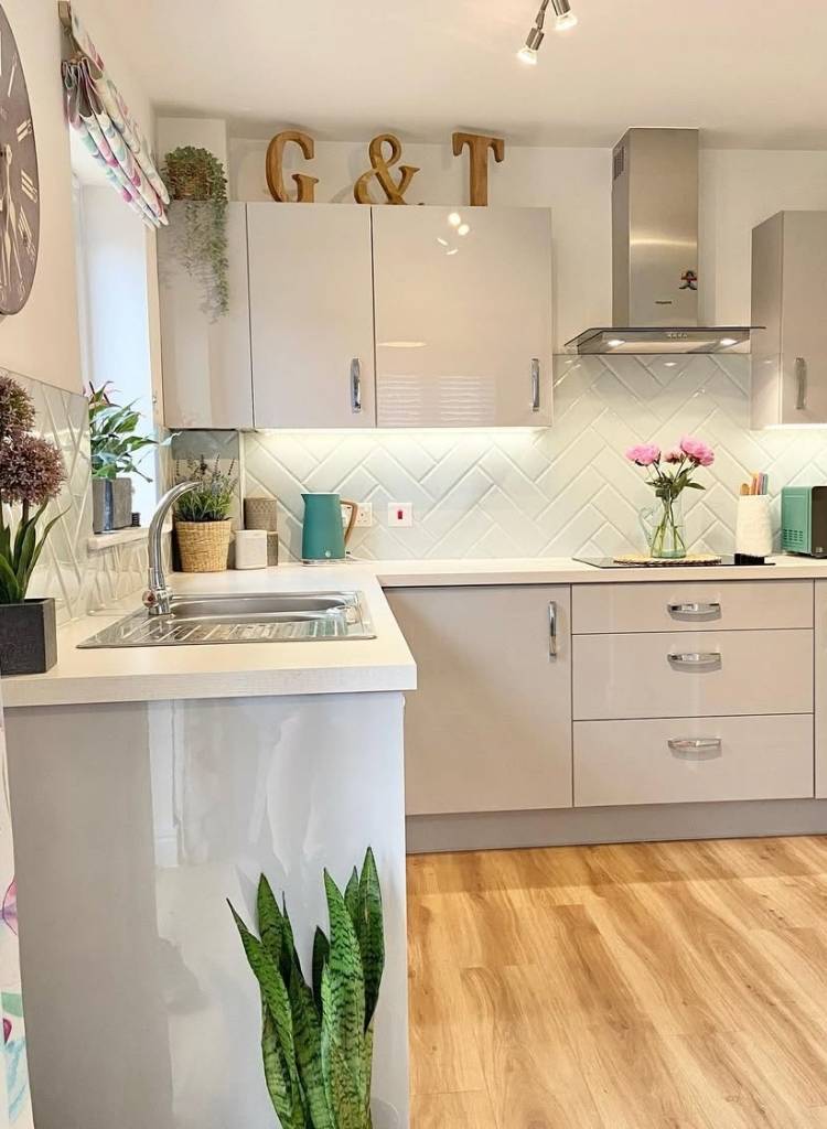 Glossy Herringbone Tile Backsplash