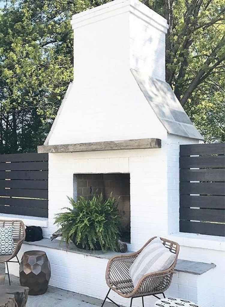 White Brick Patio Fireplace with Relaxed Seating
