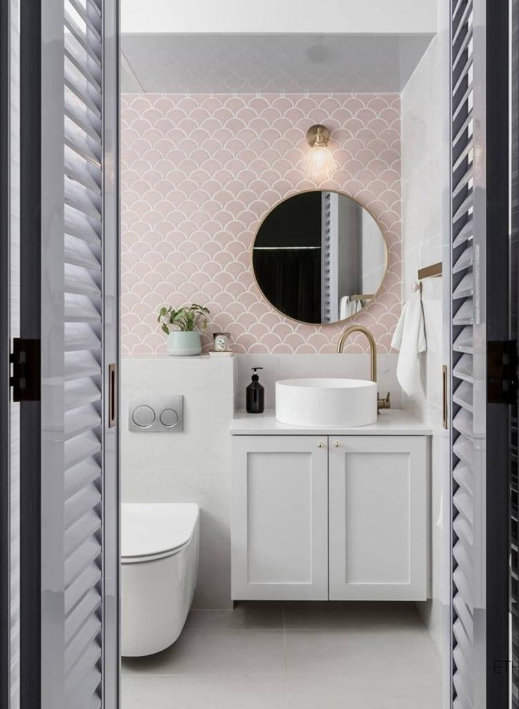 Pink Scallop Bathroom with Gold Accents