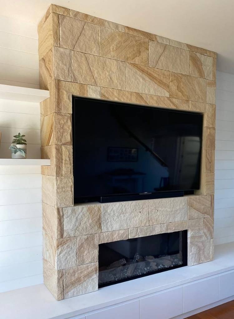 Sandstone Fireplace With Built-In Media Design
