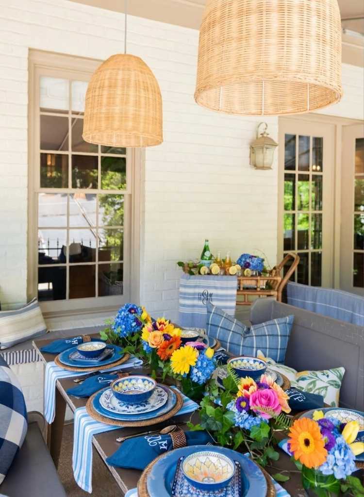 Colorful Porch Dining With Woven Lights