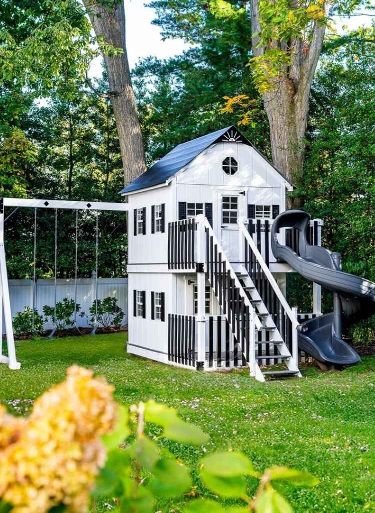 Two Story Black and White Playhouse with Swing Set