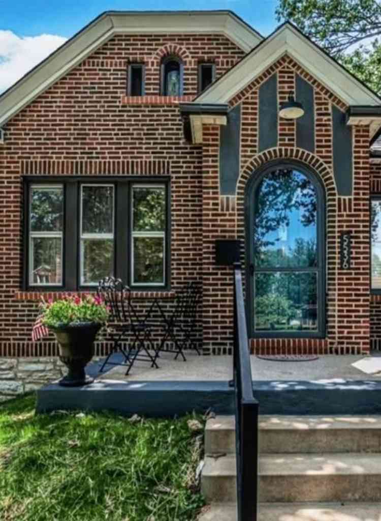 Cozy Brick Entry with Arched Door