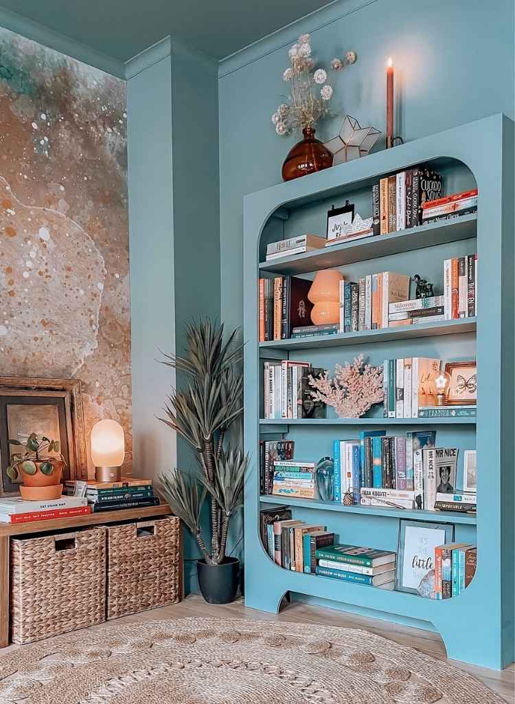 Soft Blue Corner Bookshelf with Vintage Charm